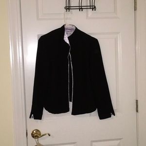 Black with a lavender silk lining